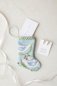 Bauble Stockings with holiday tags in a gift-themed decor
