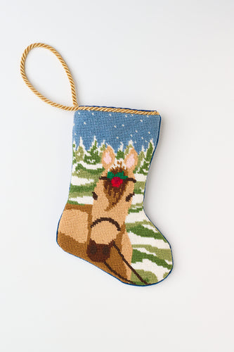 Hand-stitched Bauble Stockings featuring a palomino horse against a snowy landscape with trees