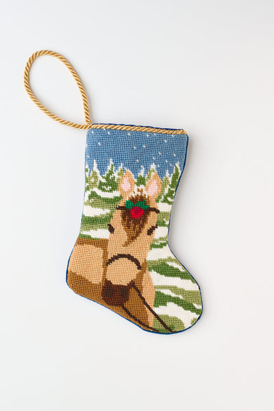 Hand-stitched Bauble Stockings featuring a palomino horse against a snowy landscape with trees
